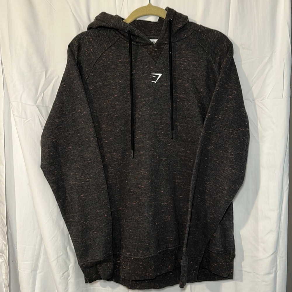 GYMSHARK hoodie. Dark grey marl with little pink-ish accents. Medium.